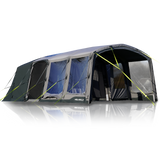 Inflatable family tent with a dark color and visible windows, set up outdoors.