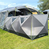 Holawild blackthorn 4.0 poled windbreak on grassy field attached next to Sherwood 8 holawild tent on sunny day with blue sky